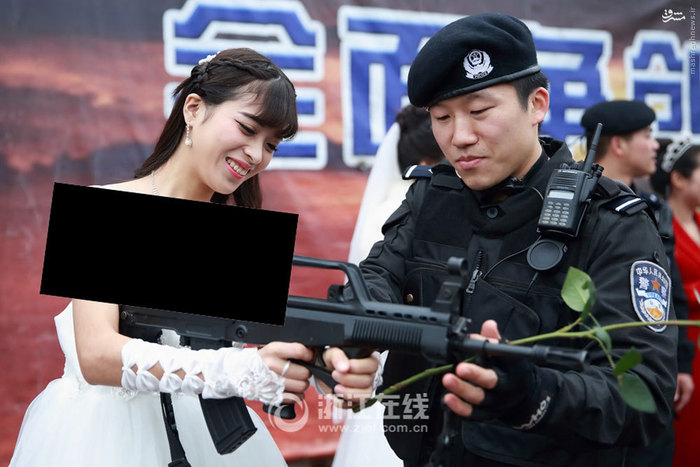 ازدواج رمانتیک پلیس ضربت چین (تصاویر) ازدواج رمانتیک پلیس ضربت چین (تصاویر)