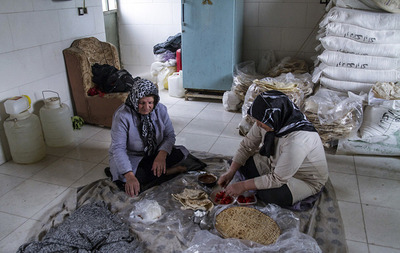 نانوایی خانمها در خمین (تصاویر) نانوایی خانمها در خمین (تصاویر)