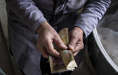 نانوایی خانمها در خمین (تصاویر) نانوایی خانمها در خمین (تصاویر)