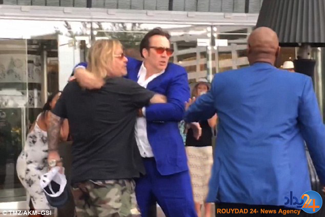 درگیری نیکلاس کیج برای یک زن (تصاویر)