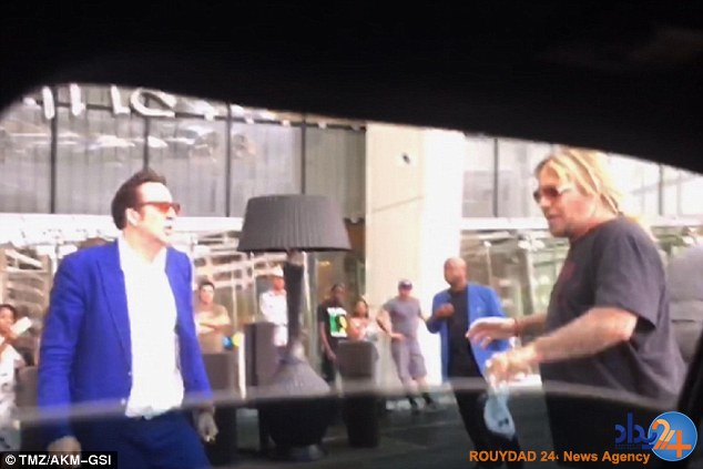 درگیری نیکلاس کیج برای یک زن (تصاویر)