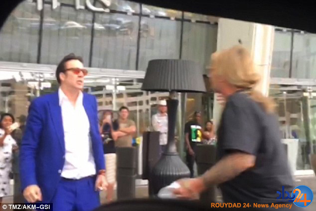 درگیری نیکلاس کیج برای یک زن (تصاویر)