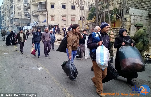 بازگشت سوری‌ها به ویرانه‌های حلب (تصاویر)