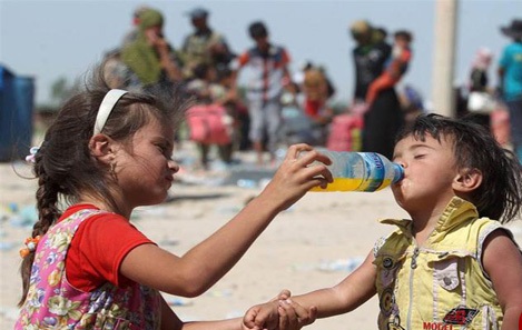 بحران در فلوجه /داعش مردم فلوجه را سپر انسانی خود قرار داده است (تصاویر) بحران در فلوجه /داعش مردم فلوجه را سپر انسانی خود قرار داده است (تصاویر)