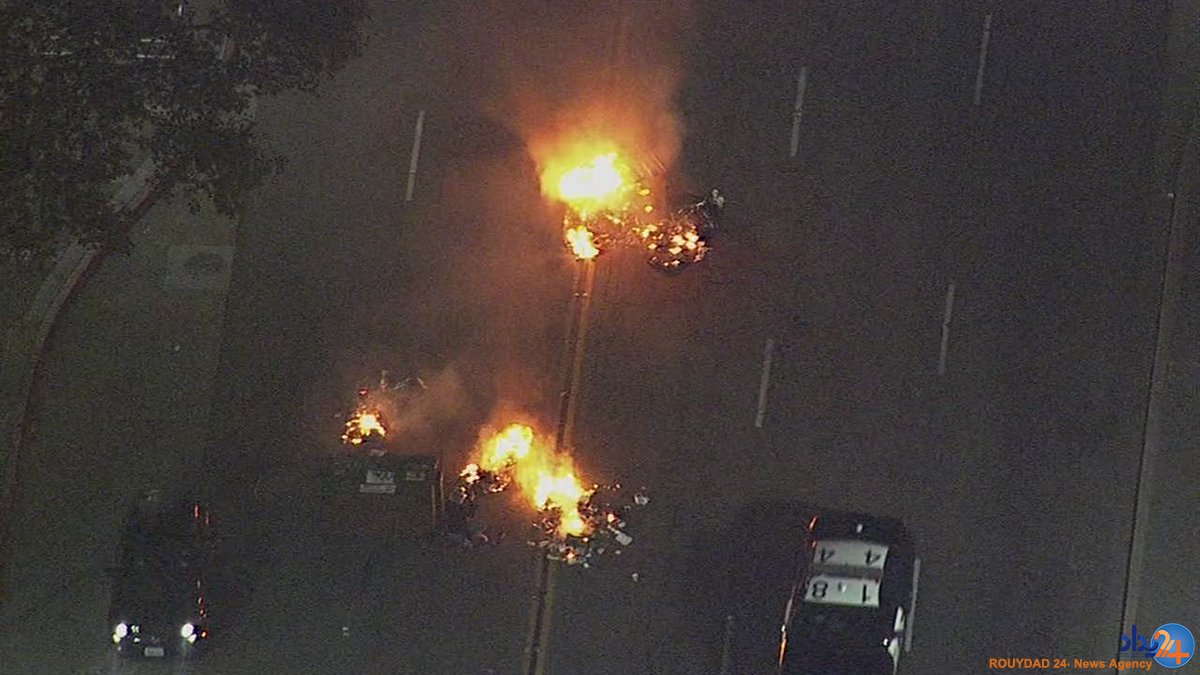 طرفداران کلینتون پرچم آمریکا را آتش زدند