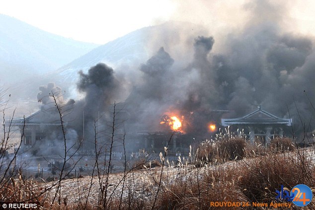 ذوقزدگی اون از حمله نظامی به ماکت کاخ ریاستجمهوری کرهجنوبی (تصاویر) ذوقزدگی اون از حمله نظامی به ماکت کاخ ریاستجمهوری کرهجنوبی (تصاویر)