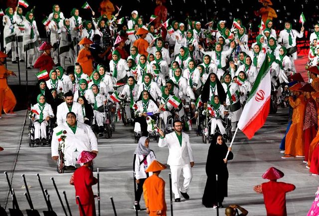 رژه ورزشکاران ایرانی در قالب کاروان خودباوری و امید با پرچمداری ساره جوانمردی +عکس