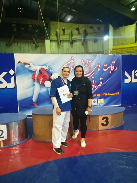 برادری که حریف تمرینی خواهرش شد/ احمدی: کشتی بانوان باید دیده شود