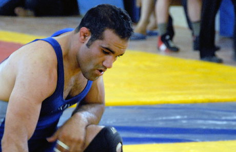 پیکر قهرمان جهان به خاک سپرده شد