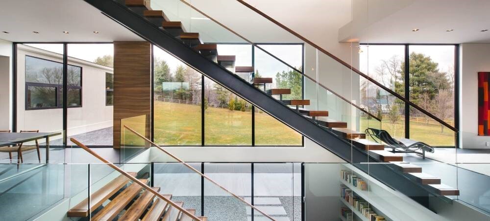 انواع شیشه ساختمانی: درب، نرده، پارتیشن و بالکن