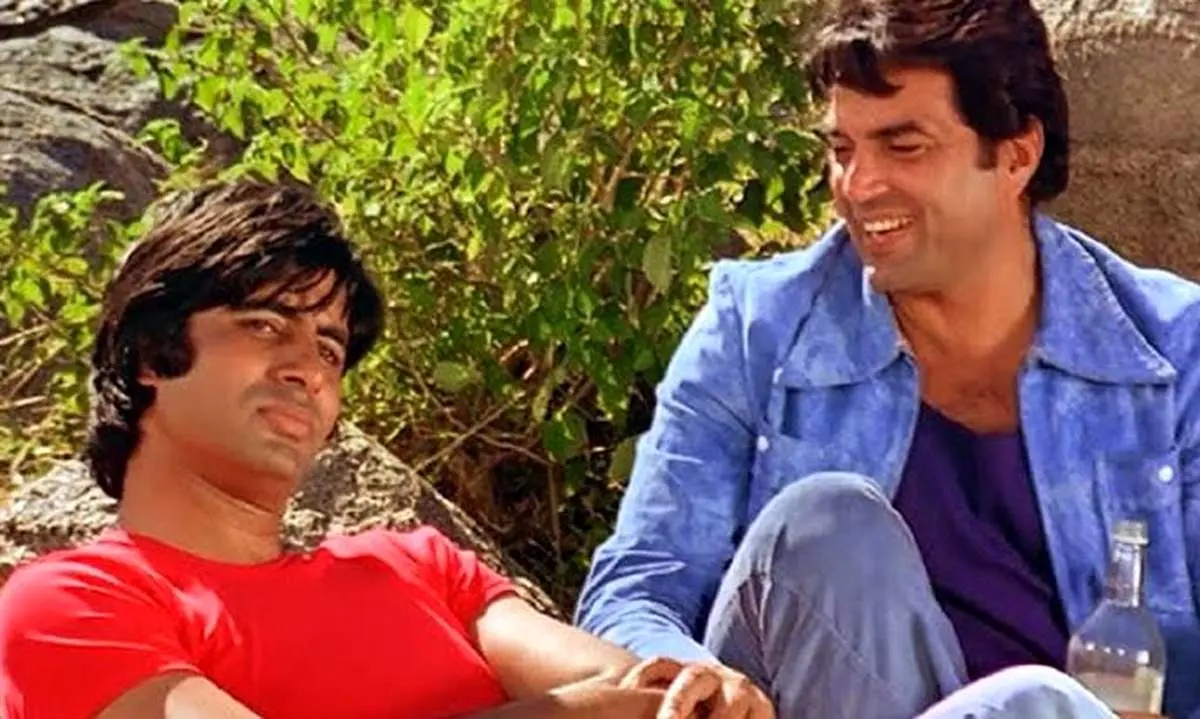 درمندرا در کنار آمیتا باچان