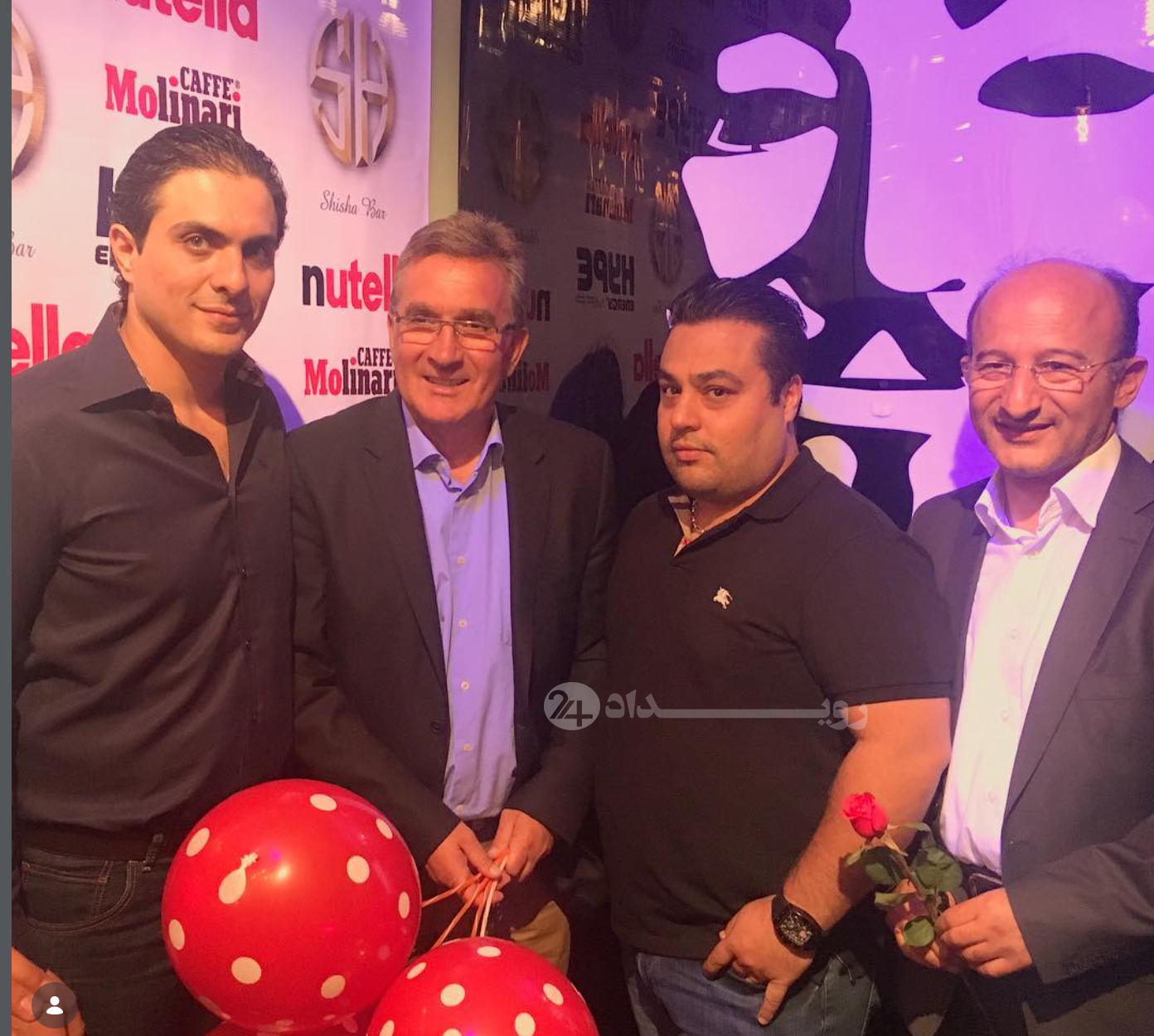 حسام در کنار برانکو ایوانکوویچ و مترجم او