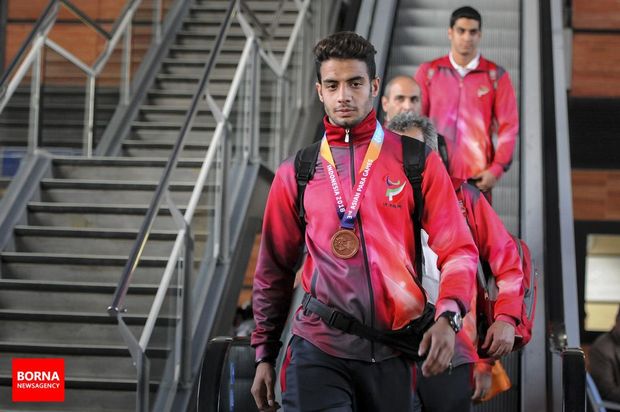 تصاویر بازگشت کاروان ورزشی ایران از بازی‌های پاراآسیایی ۲۰۱۸