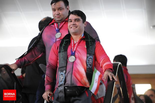 تصاویر بازگشت کاروان ورزشی ایران از بازی‌های پاراآسیایی ۲۰۱۸