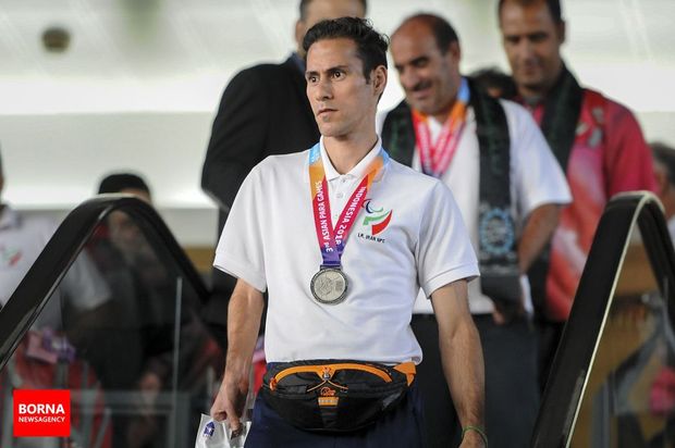 تصاویر بازگشت کاروان ورزشی ایران از بازی‌های پاراآسیایی ۲۰۱۸