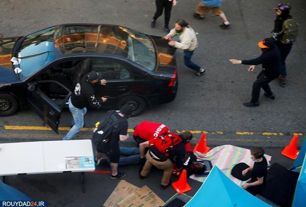 حمله با خودرو به معترضان