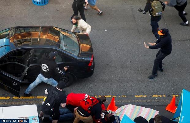 حمله با خودرو به معترضان