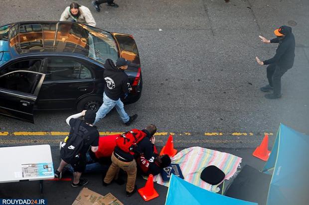 حمله با خودرو به معترضان