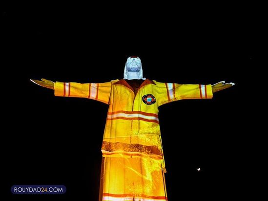 تصاویری از کادر درمان بر مجسمه مسیح