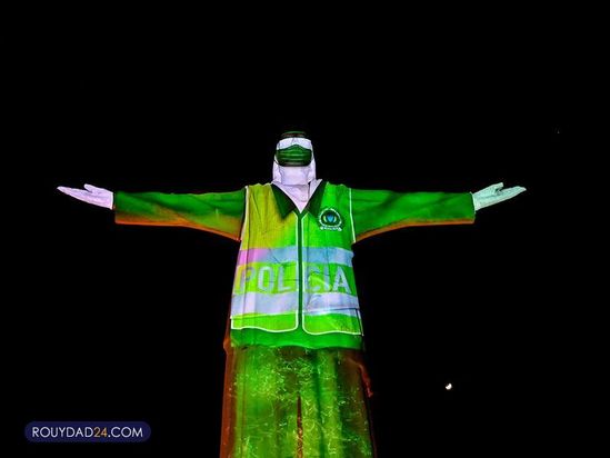 تصاویری از کادر درمان بر مجسمه مسیح