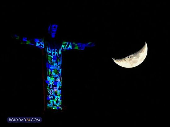 تصاویری از کادر درمان بر مجسمه مسیح