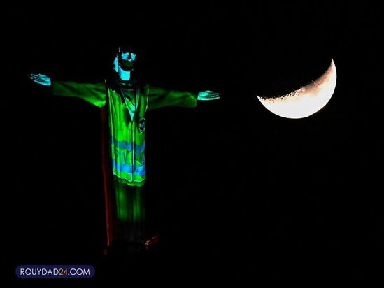 تصاویری از کادر درمان بر مجسمه مسیح