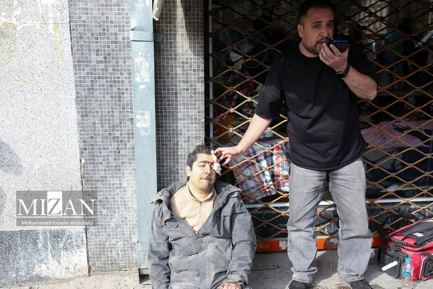 شهروندان مجروح حملات آمریکا و اسراییل در میدان فردوسی تهران