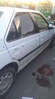 قتل هولناک در مشهد / پژو را با ۳ سرنشین به رگبار بستند + عکس