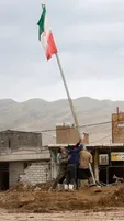 پرچم ایران در سرزمین سیل‌زدگان سراپا ماند +عکس