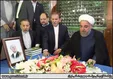 فاتحه خوانی روحانی بر سر مزار هاشمی+عکس