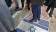 خبرگزاری میزان: ادعای پاک‌شدن پرچم آمریکا از کف اماکن دولتی کاملا کذب است