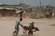 کودکان افغان در اردوگاه آوارگان در حومه شهر اسلام آباد پاکستان