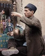 عکسی از نمایش خیمه شب بازی در دوران قاجار