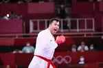 گنج زاده مدال طلایش را بر گردن سرمربی اش انداخت + فیلم